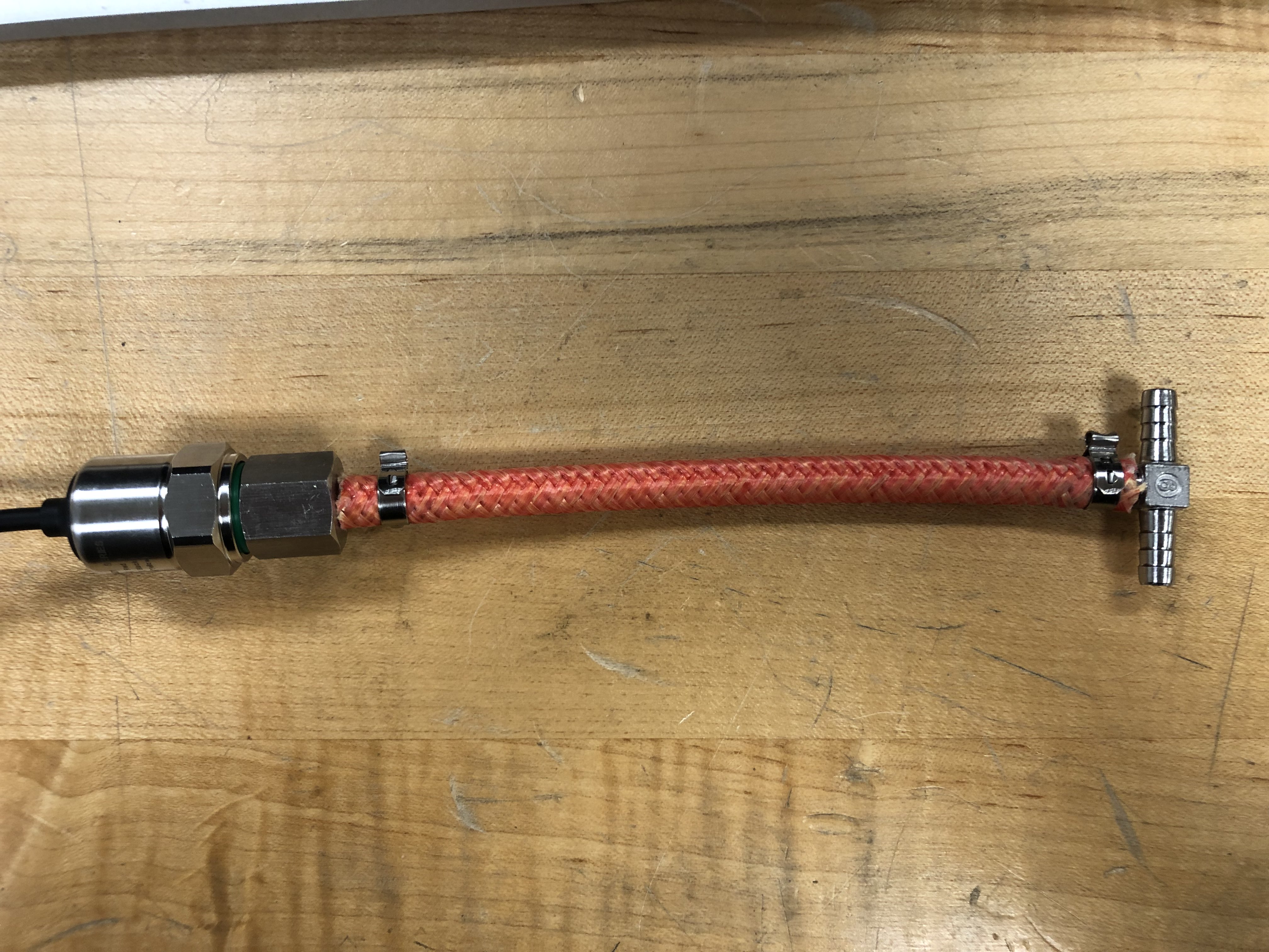 Pressure sensor assembly inside the machine